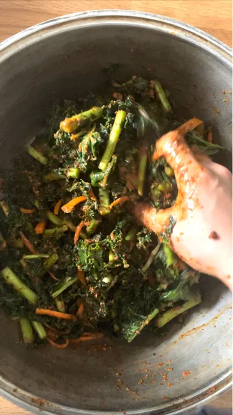 mixing in the kimchi paste